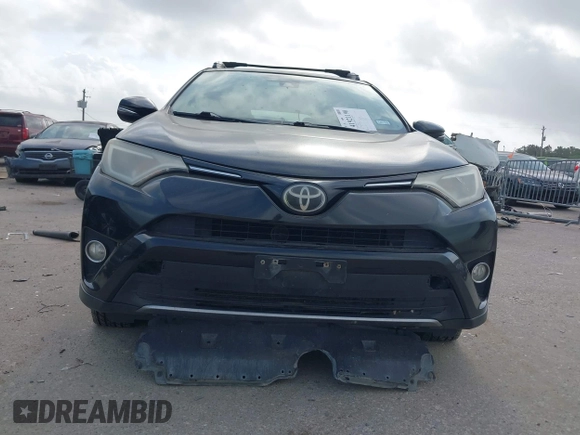 2017 Toyota RAV4 XLE with VIN 2T3WFREVXHW352608, listed as a IAAI auction lot 41921190 with 157,608 mi miles. Bid and sale history available at carsss.com. Image 6.
