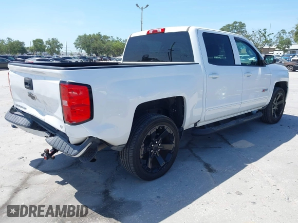 2017 Chevrolet Silverado 1500 LT with VIN 3GCUKREC4HG391101, listed as a IAAI auction lot 42129151 with 84,670 mi miles and . Bid and sale history available at DreamBid. Image 4.