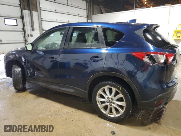 2015 Mazda CX-5 Grand Touring with VIN JM3KE4DY0F0493650, listed as a Copart auction lot 86371104 with 226,752 mi miles and Non Repairable. Bid and sale history available at DreamBid. Image 2.