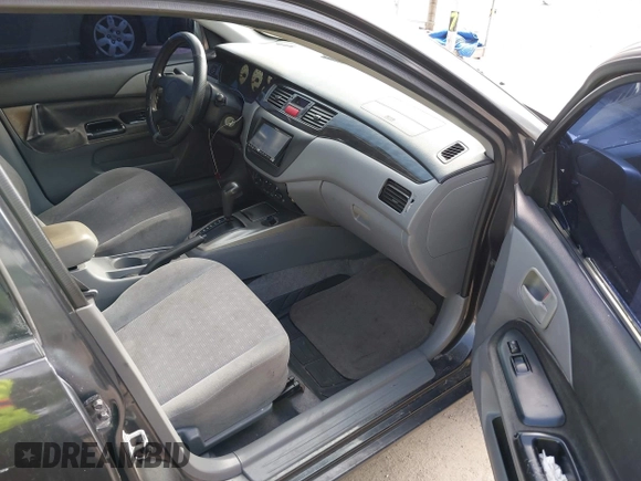 2004 Mitsubishi Lancer ES with VIN JA3AJ26E64U016149, listed as a IAAI auction lot 42438863 with 203,618 mi miles and . Bid and sale history available at DreamBid. Image 5.