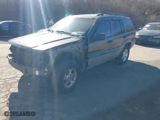 1999 Jeep Grand Cherokee Laredo with VIN 1J4GW58NXXC623753, listed as a IAAI auction lot 41685540 with 190,134 mi miles. Bid and sale history available at carsss.com. Image 2.