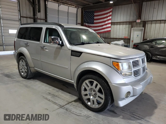 2008 Dodge Nitro R/T z VIN 1D8GU58618W151545, wystawiony jako Copart lot #75465574 z przebiegiem Nie podano mil oraz Szkoda całkowita • Salvage title. Historia ofert i sprzedaży dostępna na DreamBid. Obrazek 4.