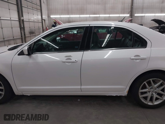 2012 Ford Fusion SEL z VIN 3FAHP0JAXCR104902, wystawiony jako IAAI lot #42471136 z przebiegiem 186 468 mil mil oraz . Historia ofert i sprzedaży dostępna na DreamBid. Obrazek 14.