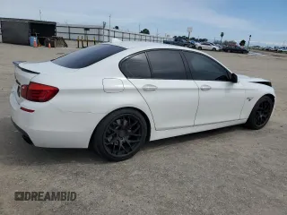 2013 BMW 5 Series 550i with VIN WBAFR9C51DDX79979, listed as a Copart auction lot 49821645 with 170,080 mi miles and Salvage Title. Bid and sale history available at DreamBid. Image 3.
