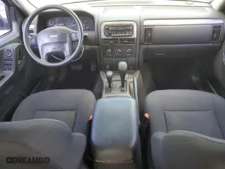 2002 Jeep Grand Cherokee Laredo with VIN 1J4GW48N02C205818, listed as a Copart auction lot 44737205 with 136,030 mi miles and Salvage Title. Bid and sale history available at carsss.com. Image 8.