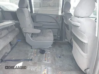 2006 Honda Odyssey EX z VIN 5FNRL38456B129594, wystawiony jako IAAI lot #42279156 z przebiegiem Nie podano mil oraz . Historia ofert i sprzedaży dostępna na DreamBid. Obrazek 8.