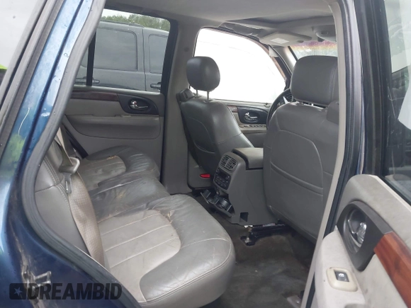 2002 GMC Envoy SLT with VIN 1GKDT13S322515582, listed as a IAAI auction lot 41528624 with 258,904 mi miles. Bid and sale history available at carsss.com. Image 8.