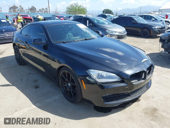 2013 BMW 6 Series 650i with VIN WBAYM9C57DDW20178, listed as a IAAI auction lot 41933561 with 72,886 mi miles and . Bid and sale history available at carsss.com. Image 1.