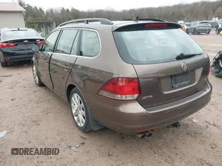 2012 Volkswagen Jetta SportWagen TDI w/Sunroof with VIN 3VWPL7AJ6CM647247, listed as a IAAI auction lot 42042449 with 186,015 mi miles. Bid and sale history available at carsss.com. Image 3.
