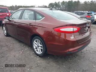 2016 Ford Fusion SE with VIN 3FA6P0HD4GR351796, listed as a IAAI auction lot 41267529 with 104,139 mi miles. Bid and sale history available at carsss.com. Image 3.