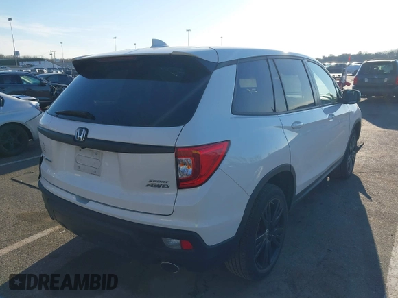 2021 Honda Passport Sport with VIN 5FNYF8H21MB031674, listed as a IAAI auction lot 41739769 with 36,894 mi miles and . Bid and sale history available at DreamBid. Image 4.