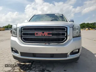 2017 GMC Yukon SLT z VIN 1GKS1BKC4HR375877, wystawiony jako Copart lot #55150545 z przebiegiem 144 788 mil mil oraz Szkoda całkowita • Salvage title. Historia ofert i sprzedaży dostępna na DreamBid. Obrazek 5.