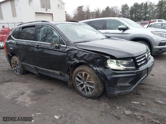 2020 Volkswagen Tiguan SE with VIN 3VV2B7AXXLM006852, listed as a IAAI auction lot 41847653 with 87,123 mi miles. Bid and sale history available at carsss.com. Image 1.