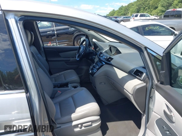 2012 Honda Odyssey Touring with VIN 5FNRL5H9XCB026741, listed as a IAAI auction lot 42808245 with 293,422 mi miles and . Bid and sale history available at DreamBid. Image 5.