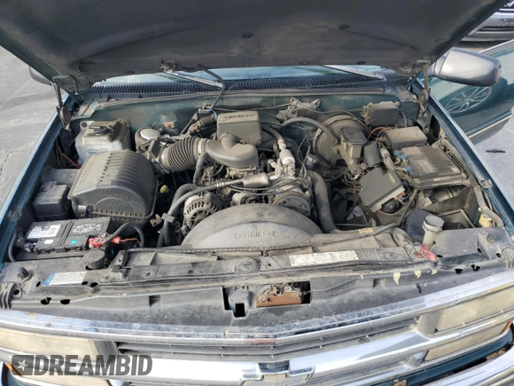 1997 Chevrolet Suburban with VIN 3GNFK16R4VG163602, listed as a Copart auction lot 76081984 with 243,169 mi miles and Salvage Title. Bid and sale history available at carsss.com. Image 12.