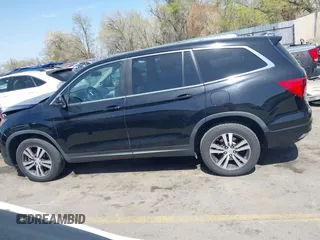 2016 Honda Pilot EX-L z VIN 5FNYF6H51GB125217, wystawiony jako IAAI lot #41993736 z przebiegiem 113 267 mil mil oraz . Historia ofert i sprzedaży dostępna na DreamBid. Obrazek 14.