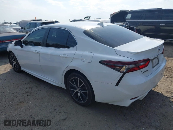 2023 Toyota Camry SE with VIN 4T1T11AK8PU826299, listed as a IAAI auction lot 41633276 with 64,107 mi miles. Bid and sale history available at carsss.com. Image 3.