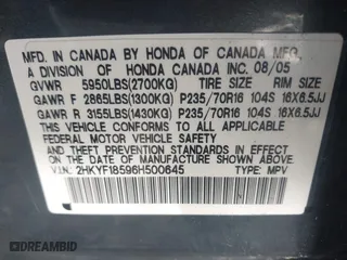 2006 Honda Pilot EX-L with VIN 2HKYF18596H500645, listed as a IAAI auction lot 41749033 with 242,599 mi miles. Bid and sale history available at carsss.com. Image 9.
