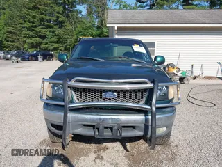 1999 Ford F-150 with VIN 1FTRX18W4XNA50527, listed as a IAAI auction lot 42563746 with 213,959 mi miles and . Bid and sale history available at DreamBid. Image 13.