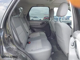 2007 Ford Escape XLT with VIN 1FMYU03127KA07084, listed as a IAAI auction lot 41931906 with 129,897 mi miles. Bid and sale history available at carsss.com. Image 8.