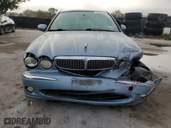 2004 Jaguar X-Type z VIN SAJEB52D54XD68737, wystawiony jako Copart lot #85168784 z przebiegiem 150 975 mil mil oraz Szkoda całkowita • Salvage title. Historia ofert i sprzedaży dostępna na DreamBid. Obrazek 5.