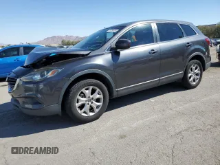 2015 Mazda CX-9 Sport z VIN JM3TB2BV7F0469064, wystawiony jako Copart lot #74280004 z przebiegiem 140 270 mil mil oraz Szkoda całkowita • Salvage title. Historia ofert i sprzedaży dostępna na DreamBid. Obrazek 1.