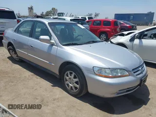2002 Honda Accord SE z VIN JHMCG66852C024173, wystawiony jako IAAI lot #42283142 z przebiegiem 172 276 mil mil oraz . Historia ofert i sprzedaży dostępna na DreamBid. Obrazek 1.
