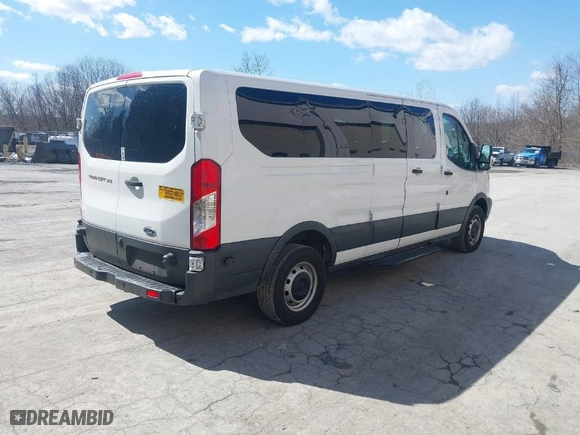 2018 Ford Transit Passenger Wagon XL with VIN 1FBZX2ZM2JKB34166, listed as a IAAI auction lot 41879889 with 152,692 mi miles. Bid and sale history available at carsss.com. Image 4.