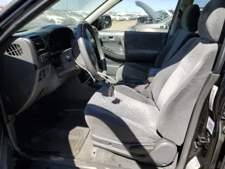 2001 Isuzu Rodeo S with VIN 4S2DM58W914354772, listed as a Copart auction lot 72208564 with 146,507 mi miles and Salvage Title. Bid and sale history available at carsss.com. Image 7.