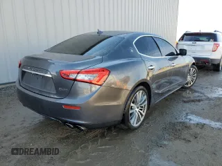 2015 Maserati Ghibli with VIN ZAM57XSA6F1158292, listed as a Copart auction lot 61963552 with 47,004 mi miles. Bid and sale history available at carsss.com. Image 4.