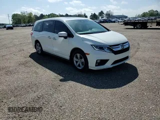 2018 Honda Odyssey EX-L z VIN 5FNRL6H78JB104144, wystawiony jako Copart lot #51513935 z przebiegiem 76 507 mil mil oraz Szkoda całkowita • Salvage title. Historia ofert i sprzedaży dostępna na DreamBid. Obrazek 11.