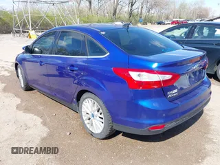 2012 Ford Focus SEL with VIN 1FAHP3H25CL283610, listed as a IAAI auction lot 41973385 with 160,732 mi miles. Bid and sale history available at carsss.com. Image 3.