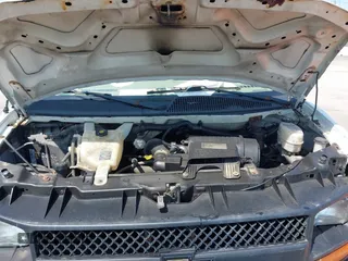 2012 Chevrolet Express Cargo Van with VIN 1GCWGFCA6C1147841, listed as a IAAI auction lot 42042056 with 248,374 mi miles. Bid and sale history available at carsss.com. Image 10.