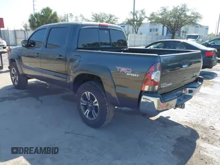 2010 Toyota Tacoma PreRunner with VIN 3TMJU4GNXAM099667, listed as a IAAI auction lot 41530993 with 201,375 mi miles and . Bid and sale history available at DreamBid. Image 3.
