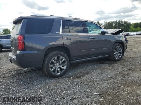 2015 Chevrolet Tahoe LTZ with VIN 1GNSKCKC9FR698924, listed as a Copart auction lot 56196895 with 184,740 mi miles and Salvage title. Bid and sale history available at DreamBid. Image 3.