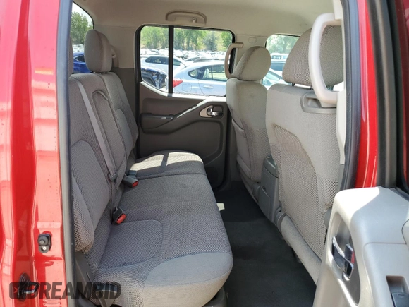 2006 Nissan Frontier LE with VIN 1N6AD07W76C460568, listed as a Copart auction lot 62859015 with 145,127 mi miles and Salvage title. Bid and sale history available at DreamBid. Image 10.