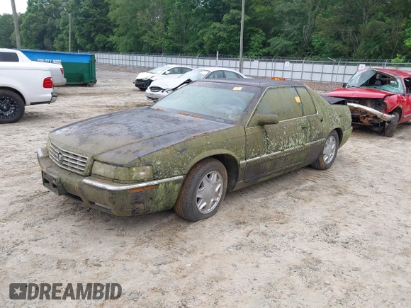 1997 Cadillac Eldorado ESC with VIN 1G6EL12Y8VU617784, listed as a IAAI auction lot 42214333 with Not Provided miles and . Bid and sale history available at DreamBid. Image 2.