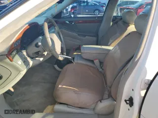 2002 Cadillac DeVille with VIN 1G6KD54YX2U104701, listed as a Copart auction lot 74187264 with 205,805 mi miles and Salvage Title. Bid and sale history available at carsss.com. Image 7.