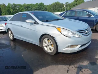 2012 Hyundai Sonata SE z VIN 5NPEC4AC7CH385089, wystawiony jako IAAI lot #42409585 z przebiegiem 181 272 mil mil oraz . Historia ofert i sprzedaży dostępna na DreamBid. Obrazek 1.