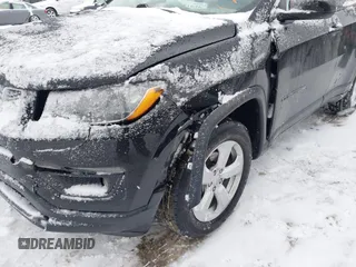 2018 Jeep Compass Altitude with VIN 3C4NJDBB6JT307069, listed as a IAAI auction lot 41351646 with 50,387 mi miles and . Bid and sale history available at carsss.com. Image 6.