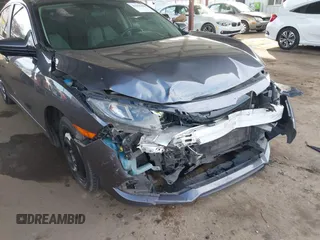 2020 Honda Civic Sedan LX with VIN 2HGFC2F61LH552858, listed as a IAAI auction lot 41554396 with 166,982 mi miles. Bid and sale history available at carsss.com. Image 6.