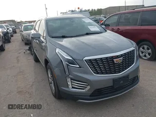 2021 Cadillac XT5 FWD Premium Luxury with VIN 1GYKNCRS5MZ128908, listed as a IAAI auction lot 41919571 with 51,280 mi miles. Bid and sale history available at carsss.com. Image 1.