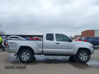 2013 Toyota Tacoma with VIN 5TFUU4EN1DX065356, listed as a IAAI auction lot 41509219 with 122,520 mi miles and . Bid and sale history available at DreamBid. Image 13.