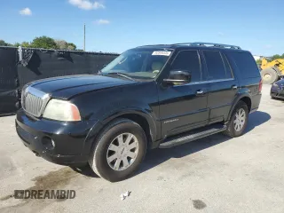 2004 Lincoln Navigator Luxury z VIN 5LMFU27R24LJ25237, wystawiony jako Copart lot #60849535 z przebiegiem 223 734 mil mil oraz Szkoda całkowita • Salvage title. Historia ofert i sprzedaży dostępna na DreamBid. Obrazek 1.