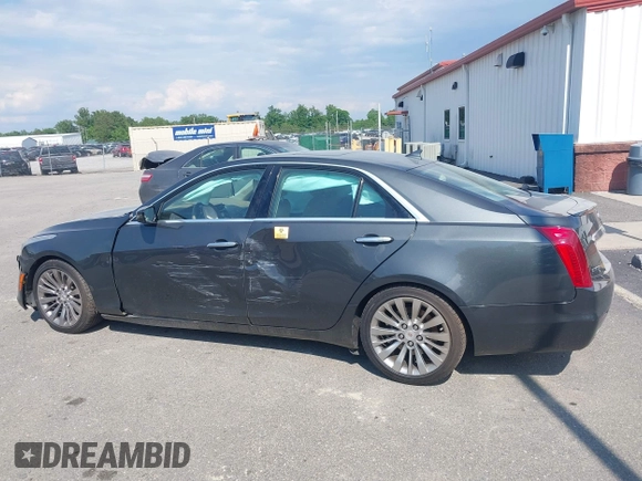 2014 Cadillac CTS Luxury AWD z VIN 1G6AX5SX7E0173466, wystawiony jako IAAI lot #42187266 z przebiegiem 115 140 mil mil oraz . Historia ofert i sprzedaży dostępna na DreamBid. Obrazek 13.