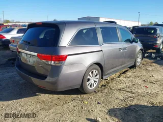 2016 Honda Odyssey SE with VIN 5FNRL5H36GB124005, listed as a IAAI auction lot 41813215 with 149,697 mi miles. Bid and sale history available at carsss.com. Image 4.