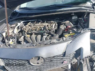 2010 Toyota Corolla with VIN 2T1BU4EE7AC447067, listed as a IAAI auction lot 42077793 with 158,093 mi miles. Bid and sale history available at carsss.com. Image 9.