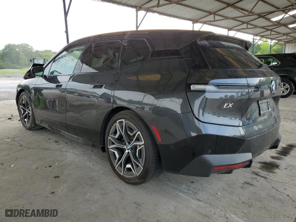 2022 BMW iX xDrive50 with VIN WB523CF02NCJ71343, listed as a Copart auction lot 53404674 with 14,917 mi miles and Salvage Title. Bid and sale history available at carsss.com. Image 2.