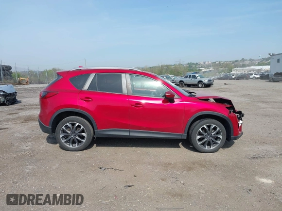 2016 Mazda CX-5 Grand Touring with VIN JM3KE4DY9G0850583, listed as a IAAI auction lot 42075545 with 92,789 mi miles and . Bid and sale history available at carsss.com. Image 13.