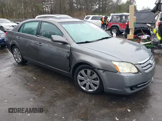 2007 Toyota Avalon XL with VIN 4T1BK36B27U204147, listed as a IAAI auction lot 41585882 with 166,303 mi miles. Bid and sale history available at carsss.com. Image 1.